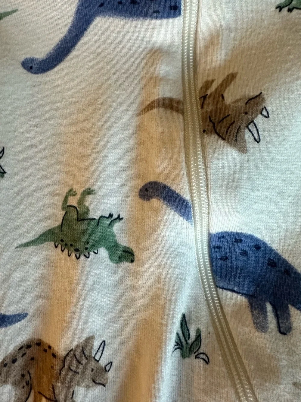 Carter's Cream Footed One-Piece with Blue, Green and Brown Dinosaurs